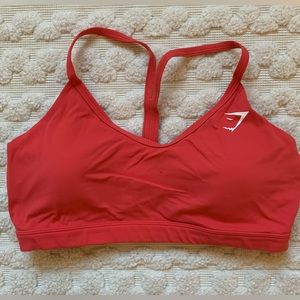 Gymshark v-neck sports bra in red size L. Worn/washed once so basically new.